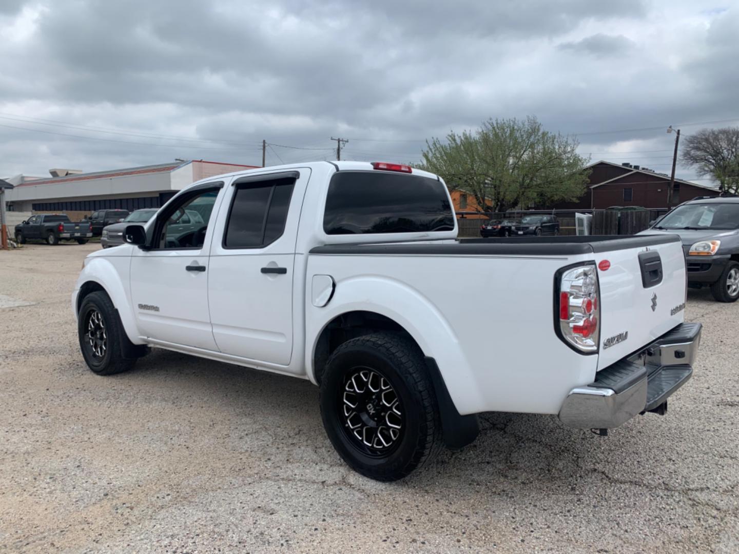 2012 White Suzuki Equator Sport Crew Cab 2WD (5Z61D0ER4CC) with an 4.0L V6 DOHC 24V engine, Automatic transmission, located at 1830 North Belt Line Road, Irving, TX, 75061, (469) 524-0199, 32.834373, -96.993584 - Photo#3